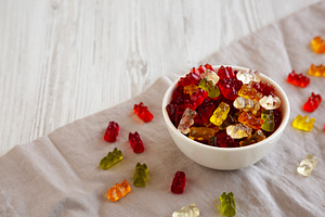 Colorful Gummy Bears in a Bowl, side view. Copy space., a Food & Drink Photo by LiudmylaChuhunova