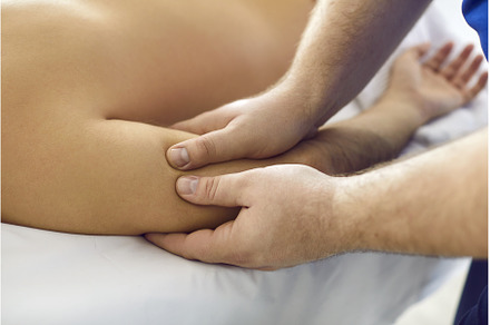 Masseur at spa salon doing, a Health & Medical Photo by StudioRomantic