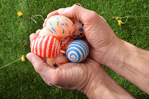 Hands Holding Colorful Easter Eggs Outdoors, a Holiday Photo by Davizro's Market
