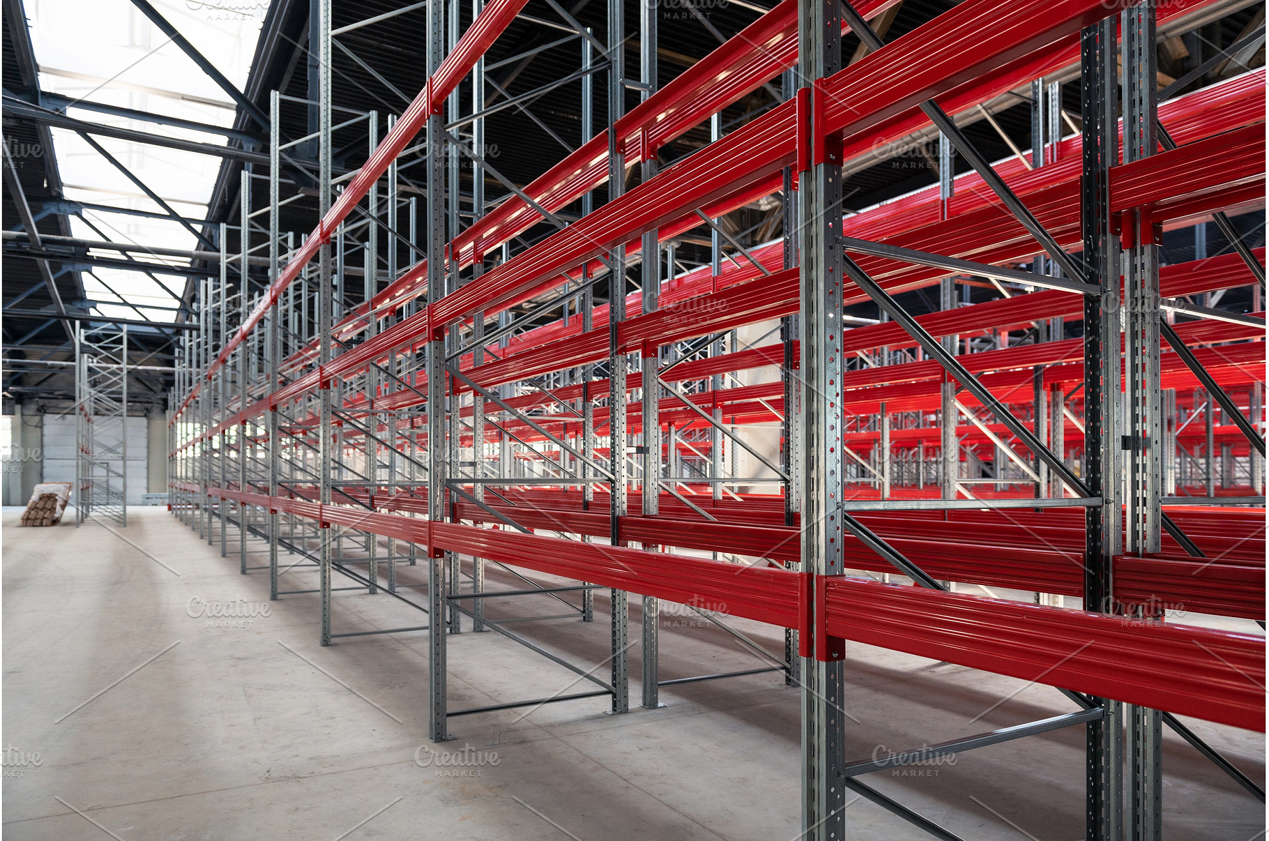 Warehouse with empty high pallet, an Industrial Photo by Jan Jack Russo Media