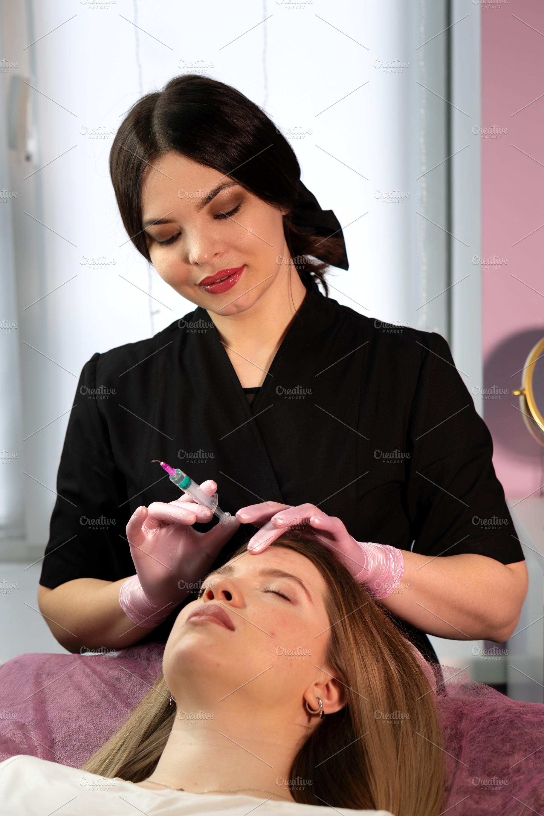 Aesthetician performing non-surgical, a Health & Medical Photo by Elena Vagengeim