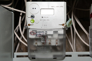 Electrical meter with electrical power cables, a Technology Photo by Vapi