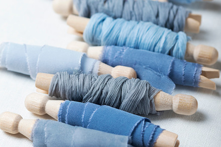 Pattern with handmade blue colored silk ribbons, a Beauty & Fashion Photo by oxana.denezhkina