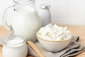 Fresh cottage cheese, milk, and yogurt creating a healthy breakf, a Food & Drink Photo by Olena Rudo