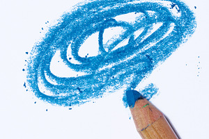 Blue wooden pencil and shading on white background, an Abstract Photo by ndanko