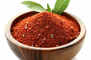 Chili Powder in wooden bowl with red, a Food & Drink Photo by Pixeness Studio