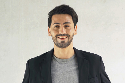 Portrait of business middle east man, person talking to colleagu, a Photo by Tampatra