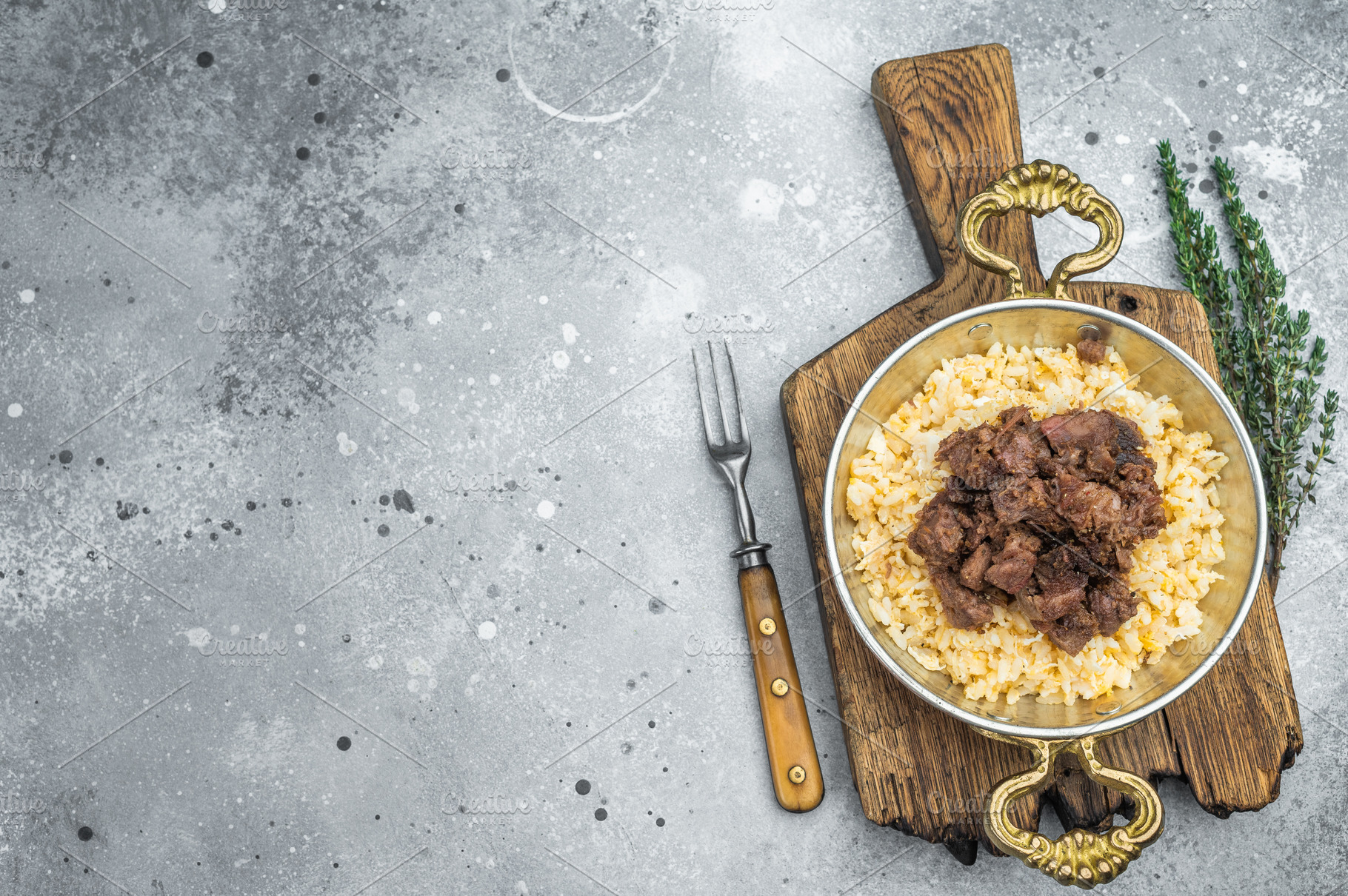 Kawurma qawurma layered over aromatic rice pilaf, highlighting s, a Food & Drink Photo by composter-box@mail.ru