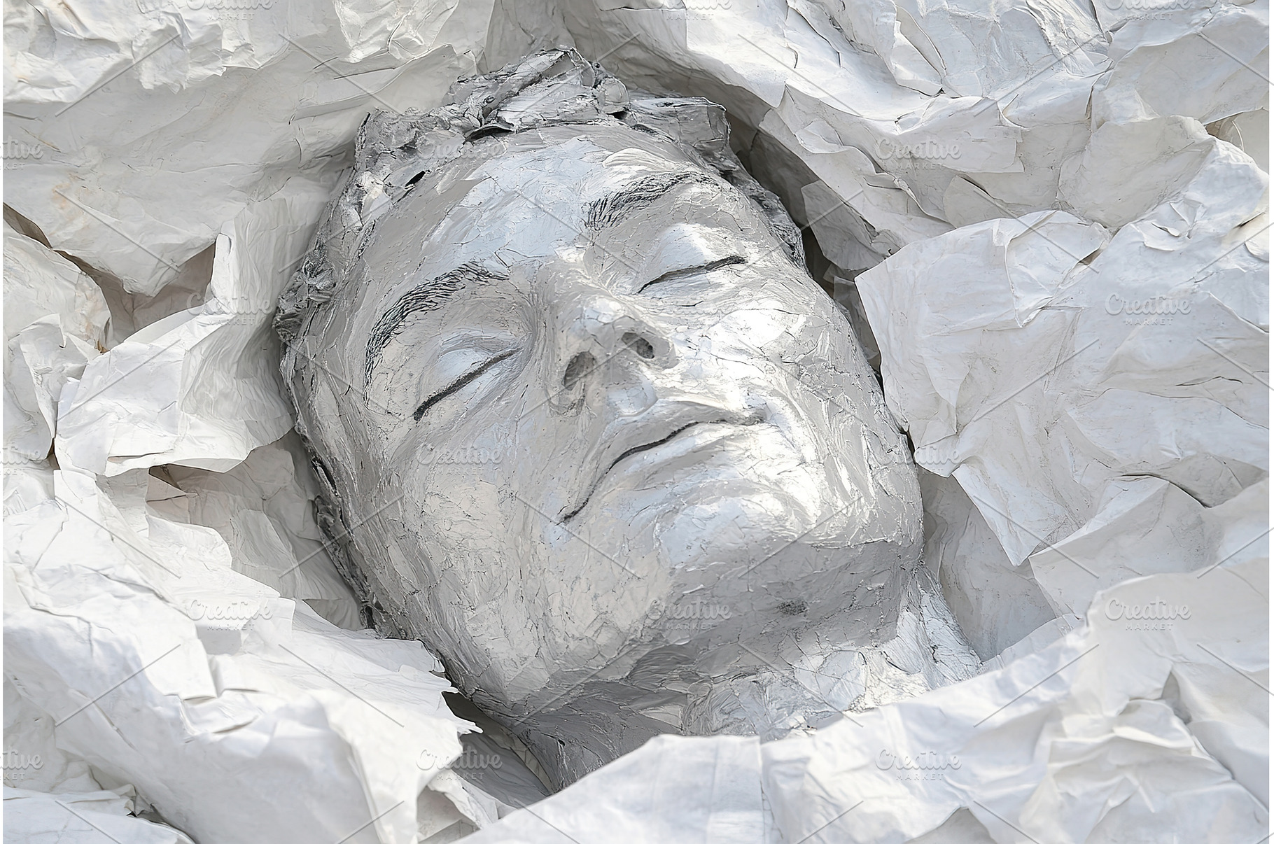 Silver Painted Human Head Enclosed, a Background Photo by Lermont51