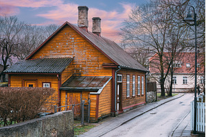 Traditional orange wooden house with, an Architecture Photo by Our Amazing World