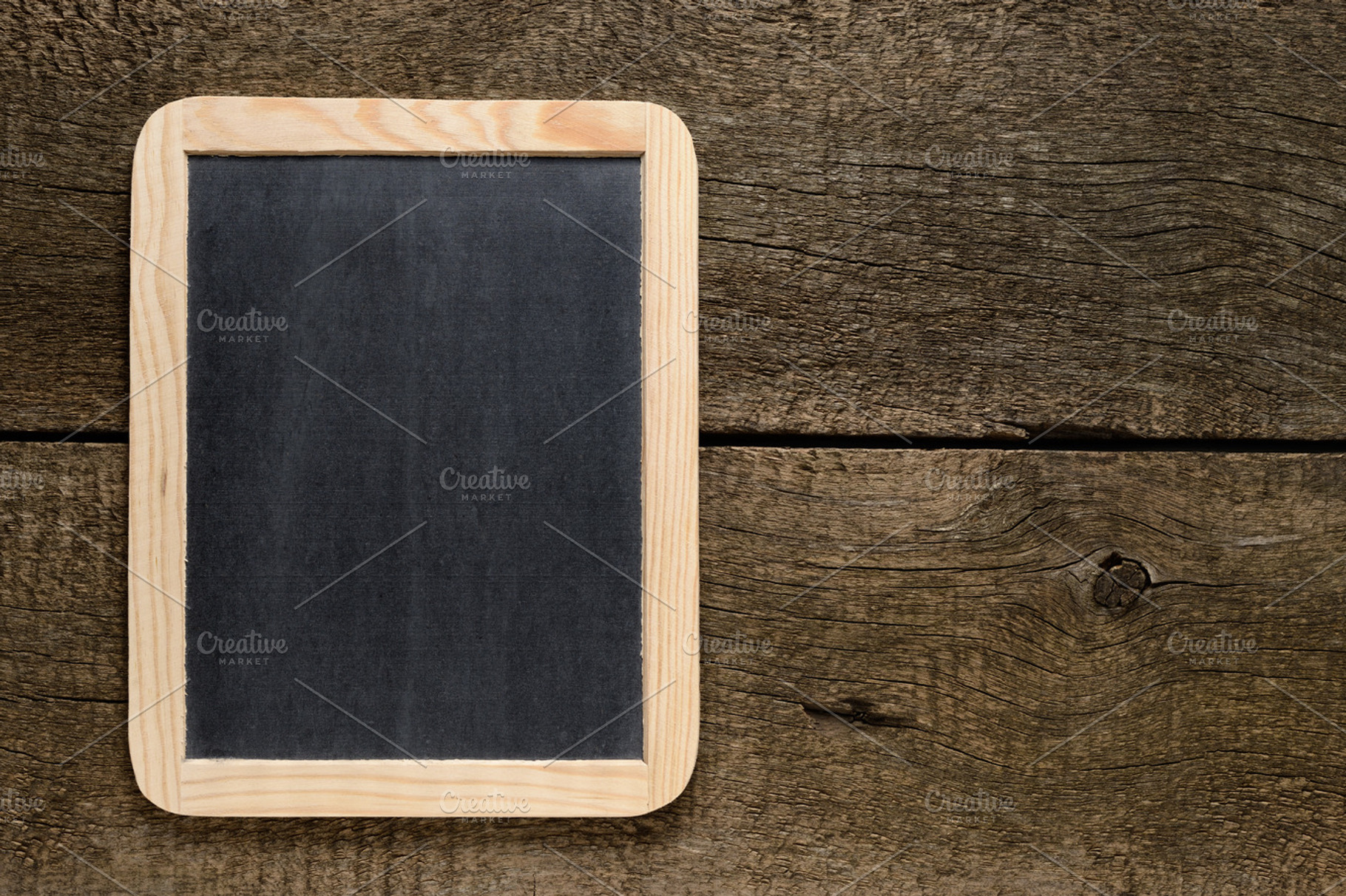Blackboard on old wood stock photo containing blackboard and chalkboard