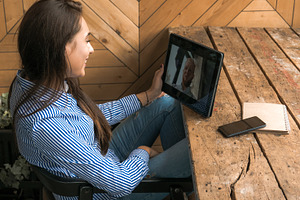 Having video call with a friend stock photo containing female and woman