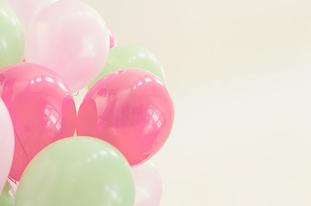 Party balloons stock photo containing pink and green