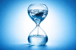 planet earth inside an hourglass, generative AI, a Photo by Nito
