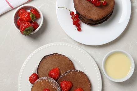Concept of sweet food, chocolate pancakes, top view, a Food & Drink Photo by AtlasStudio PRO