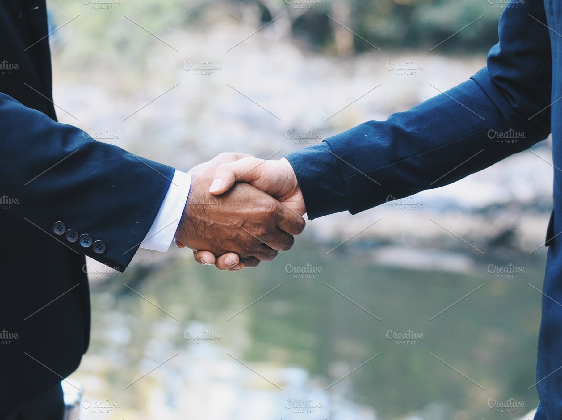 Green business handshake deal, a Business Photo by PEMIKA