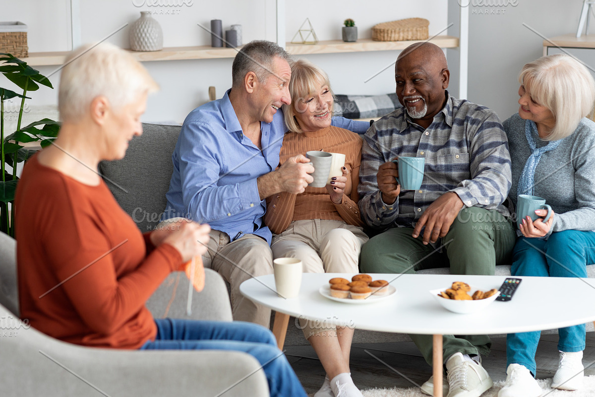 Positive multiracial senior people spending time together at retirement house, a Photo by Prostock-Studio (Photo 1 of 2)