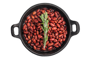 Red kidney beans with a sprig of rosemary in a cast iron pan. Ov, a Food & Drink Photo by composter-box@mail.ru