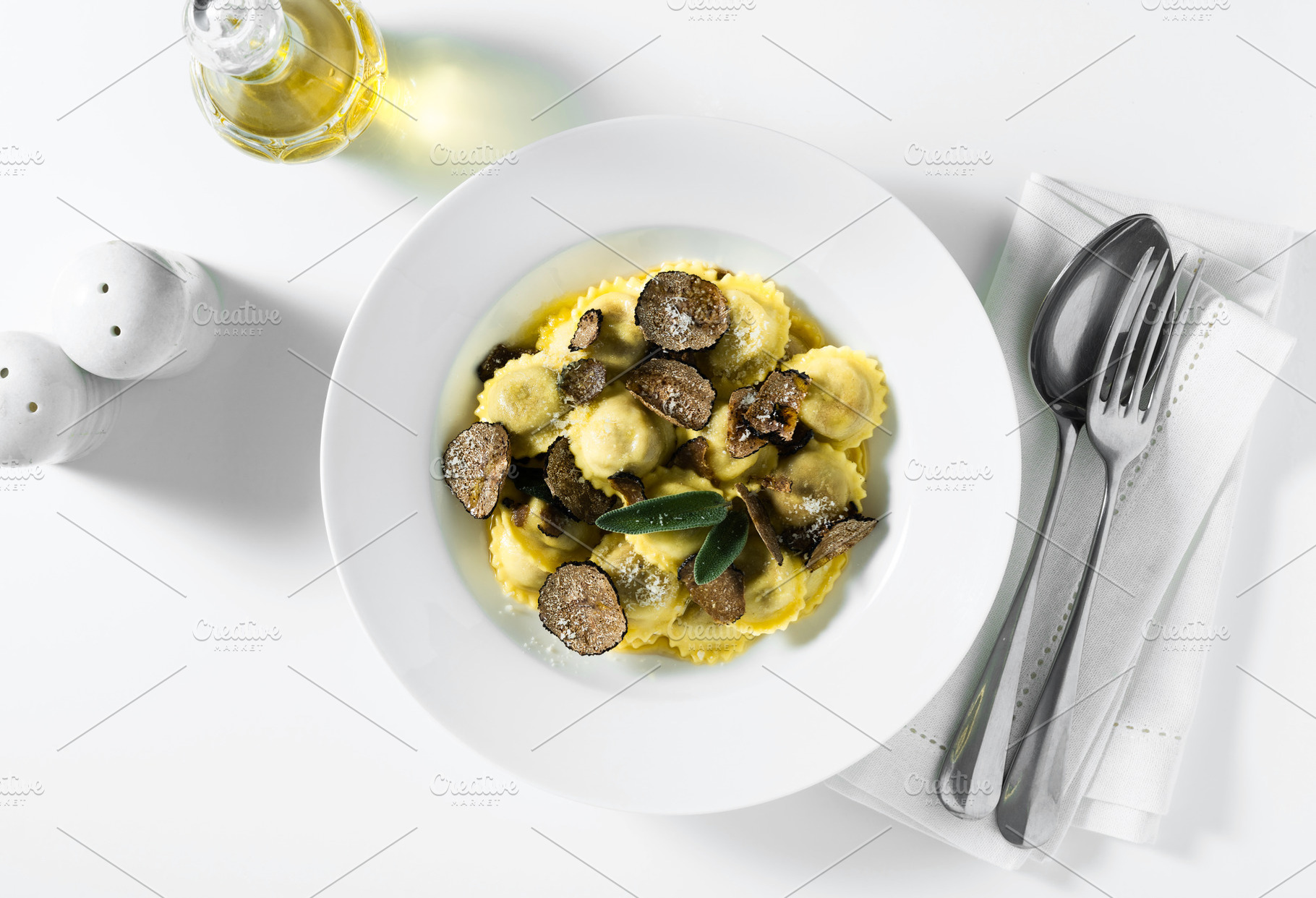 Italian ravioli with butter, parmesan cheese and truffle on the, a Food & Drink Photo by IriGri