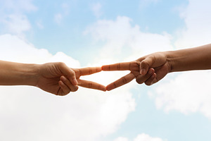 Two hands forming a peace sign together against the sky, symboli, a Photo by salmon.black