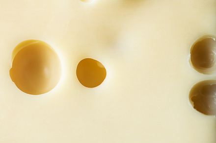 French Emmental semi-hard cheese., a Food & Drink Photo by Galiyah Assan