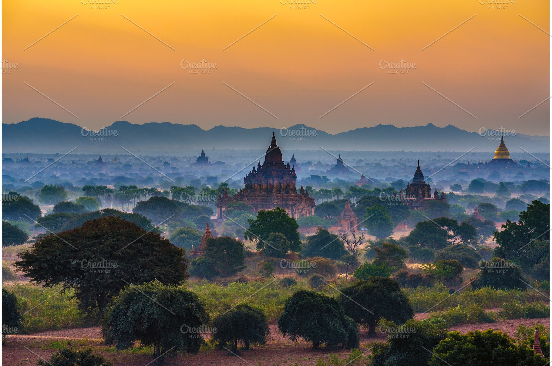 Sunrise over the ancient temples of, an Architecture Photo by Nick Fox