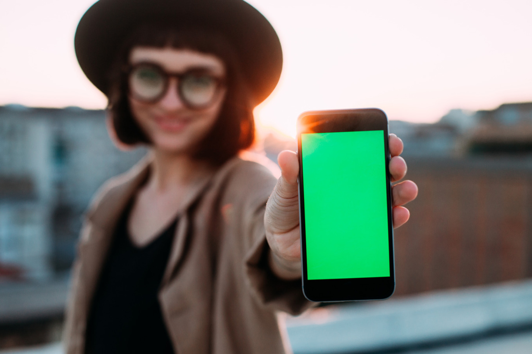 Girl with mockup phone screen, a Holiday Photo by DeRepente