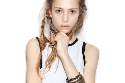 Beautiful woman with pigtails stock photo containing woman and fashion, a Person Photo by Aliaksei Kaponia