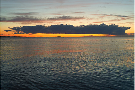 Long big dark cloud over the sea at, a Nature Photo by Oleksandr Berezko