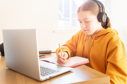 School age girl is home schooling featuring online, school, and laptop, a School & Education Photo by MAnuta