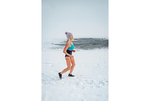 Elderly winter swimmer warming up, a Sports & Recreation Photo by HalfPoint