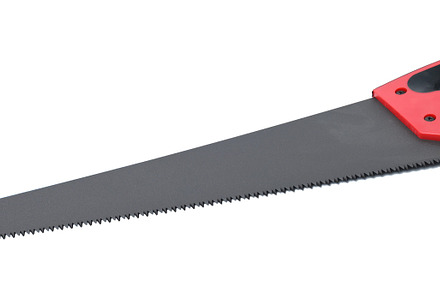 New hand saw with a rubber red handle on a white isolated backgr, an Industrial Photo by ndanko
