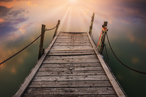 Wooden Pier at Dawn with Radiant Lig, a Nature Photo by Perpis