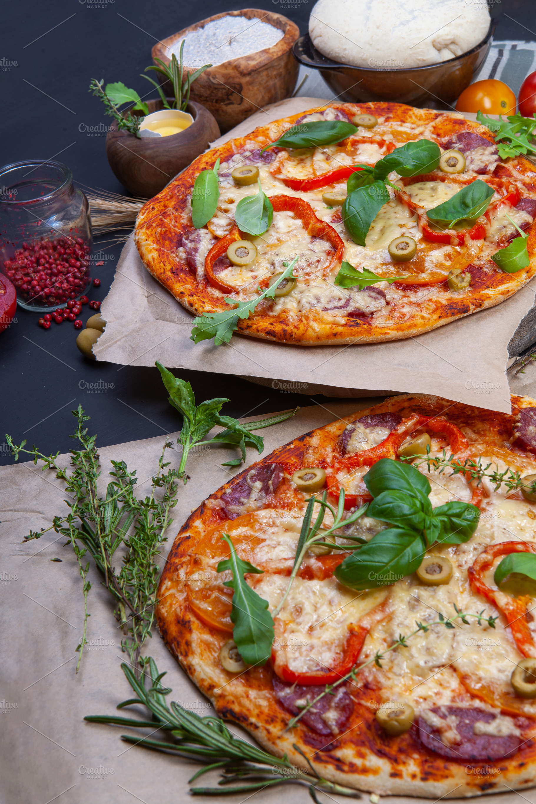 Delicious fresh pizza on dark, a Food & Drink Photo by eleana