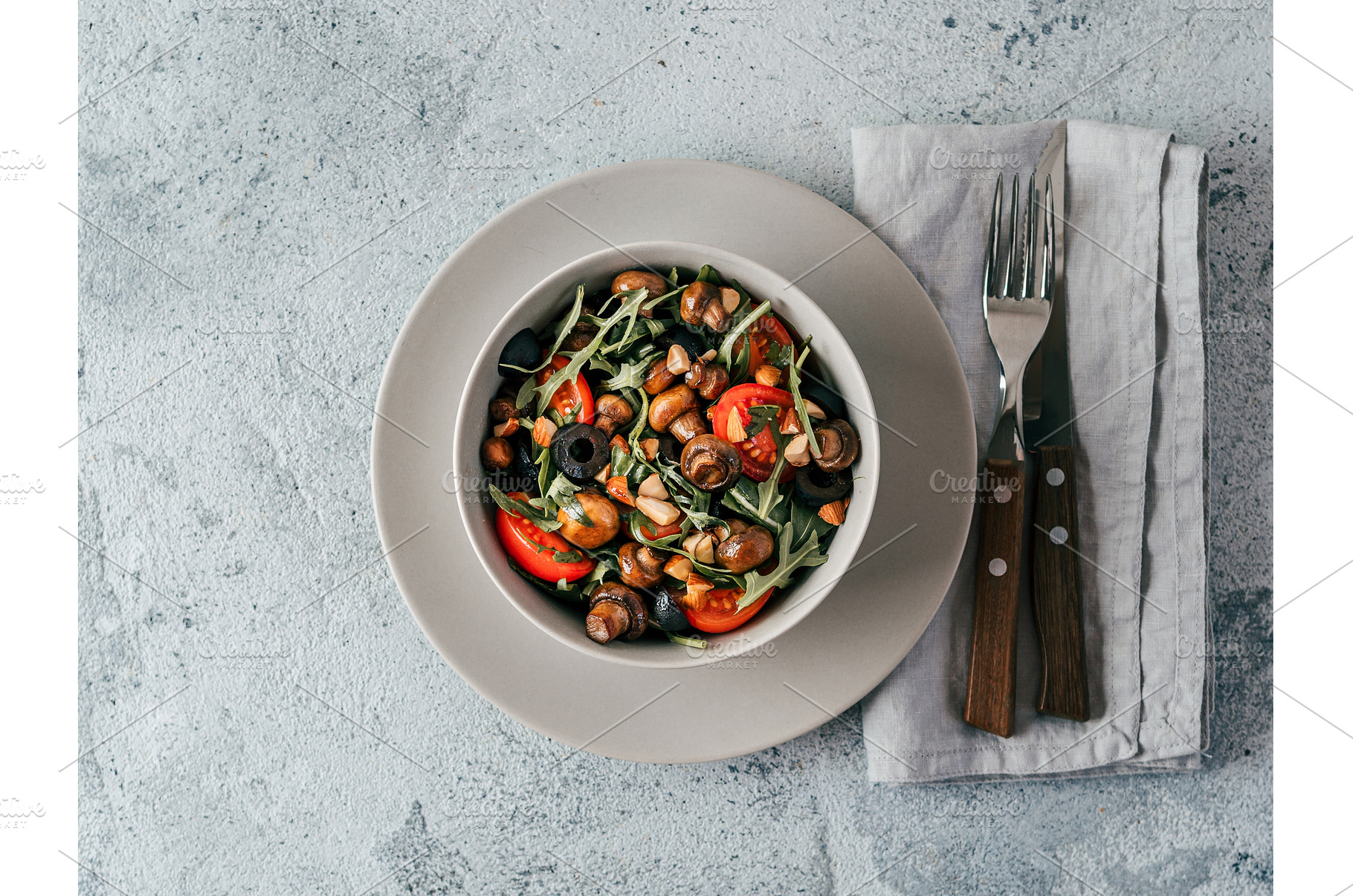 Salad with arugula, mini champignons, a Food & Drink Photo by Fascinadora