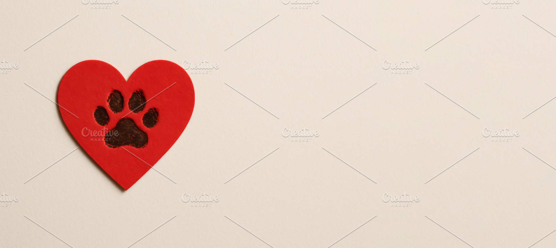 Heart-shaped red paper with paw prin, a Photo by Dvoevnore photos