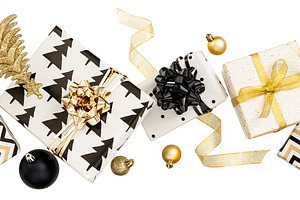 Creative composition of festive present boxes. Free levitation. Black and gold