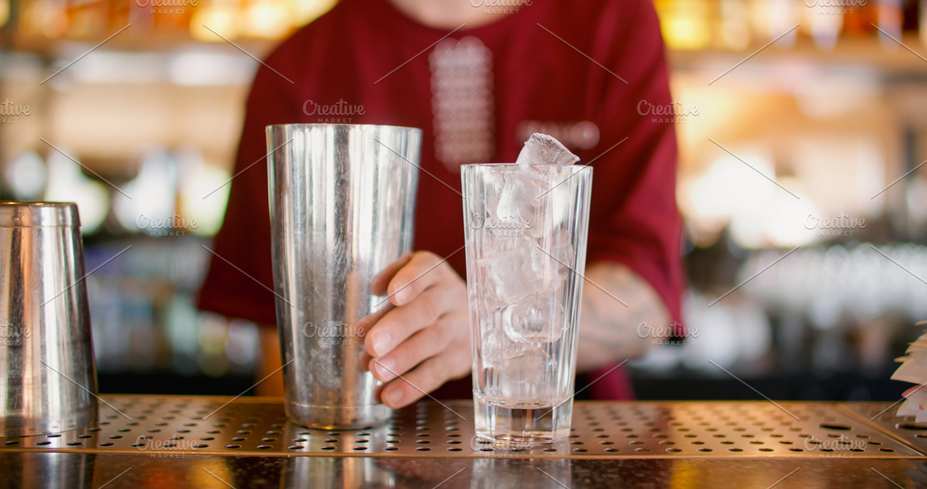 Preparing cocktail barkeeper counter shaker glass, a Food & Drink Photo by Photo Drive Studio
