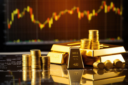 Gold bars and coins on the backgroun, a Photo by Iftikhar Alam