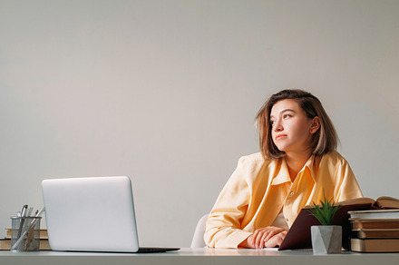 Laptop studying pensive freelancer thoughtful girl, a Person Photo by Photo Drive Studio