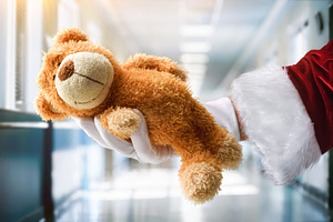 Santa hand and teddy for hospitalized children at Christmas, a Holiday Photo by Davizro's Market