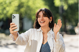 A selfie for the loved ones, a Person Photo by AD Stock Images