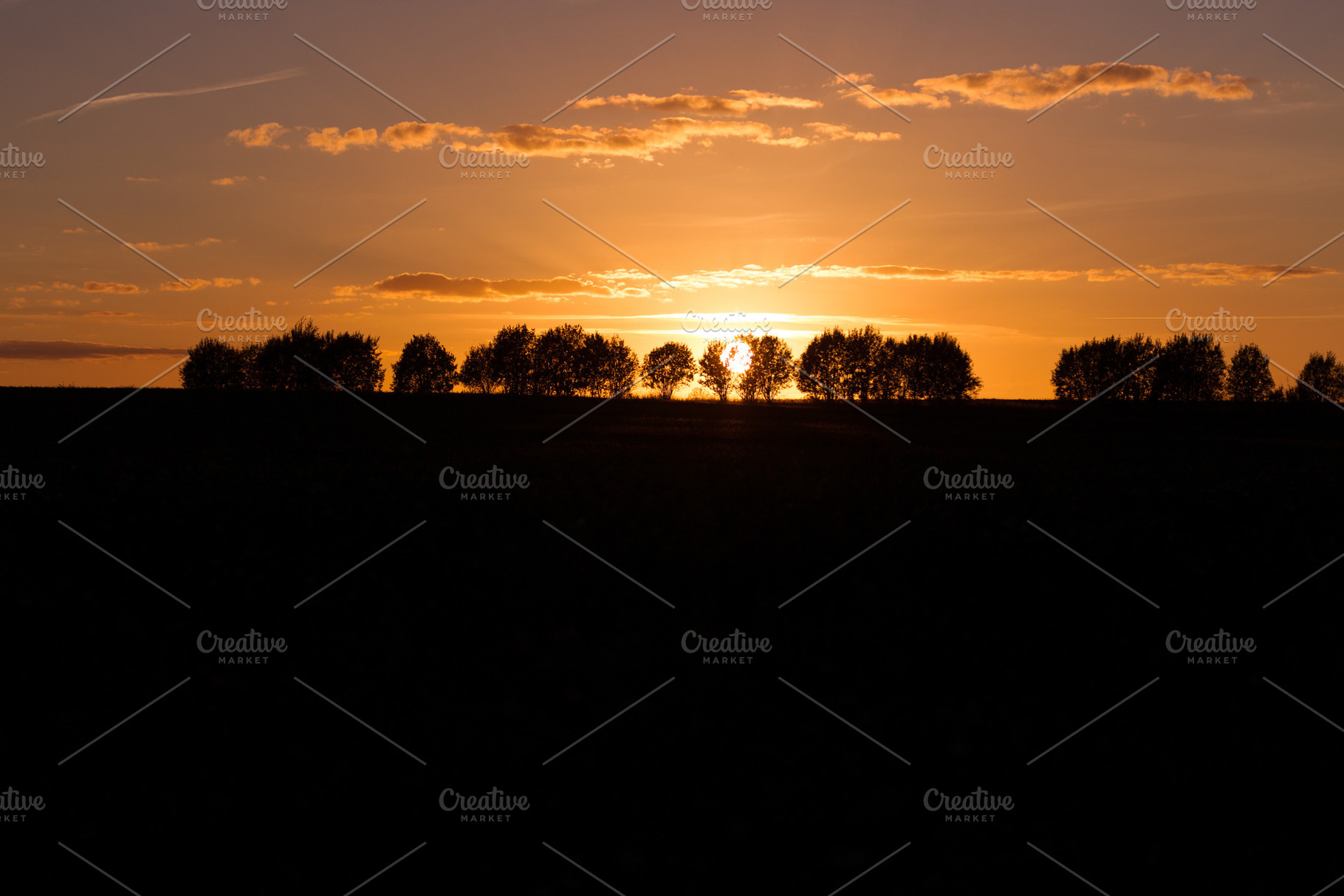 Evening landscape with silhouettes o containing sunset, landscape, and evening, a Nature Photo by oleghz