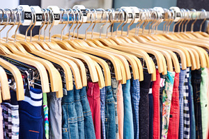 Casual clothing on wooden hangers, a Beauty & Fashion Photo by BOOCYS