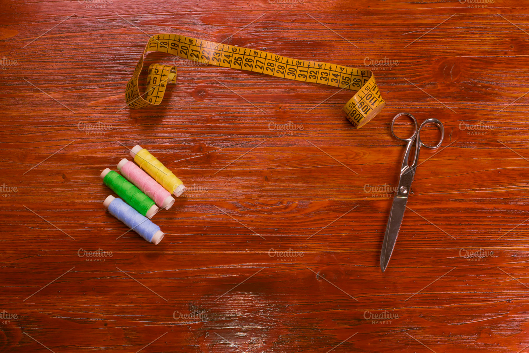 Colored threads, scissors, and tape, a Beauty & Fashion Photo by José Luis Agudo