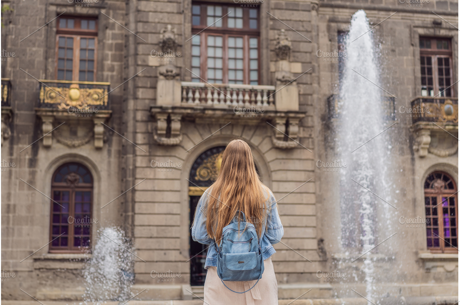 Young woman tourist standing near, an Architecture Photo by Elizaveta Galitskaya