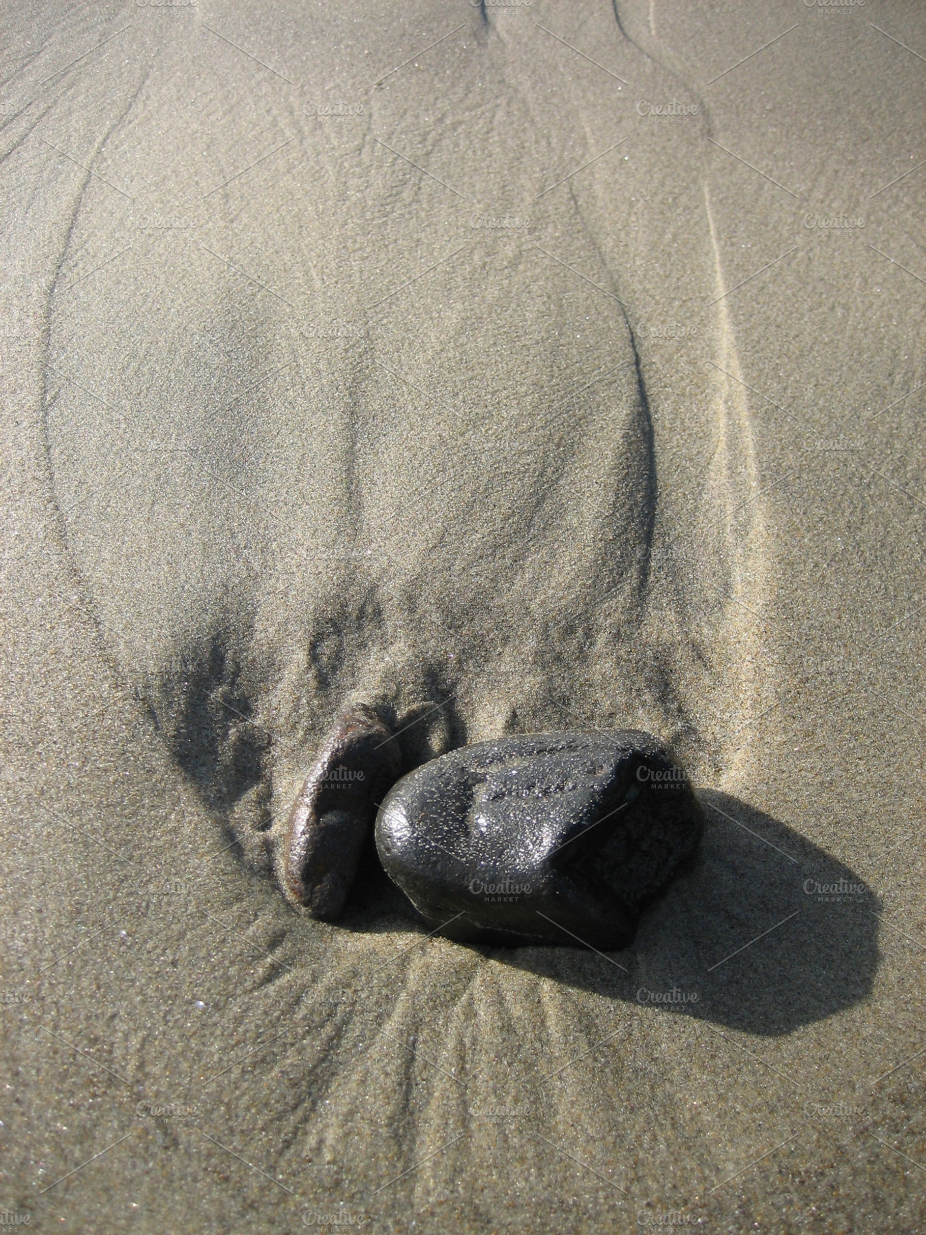 Rocks In The Sand
