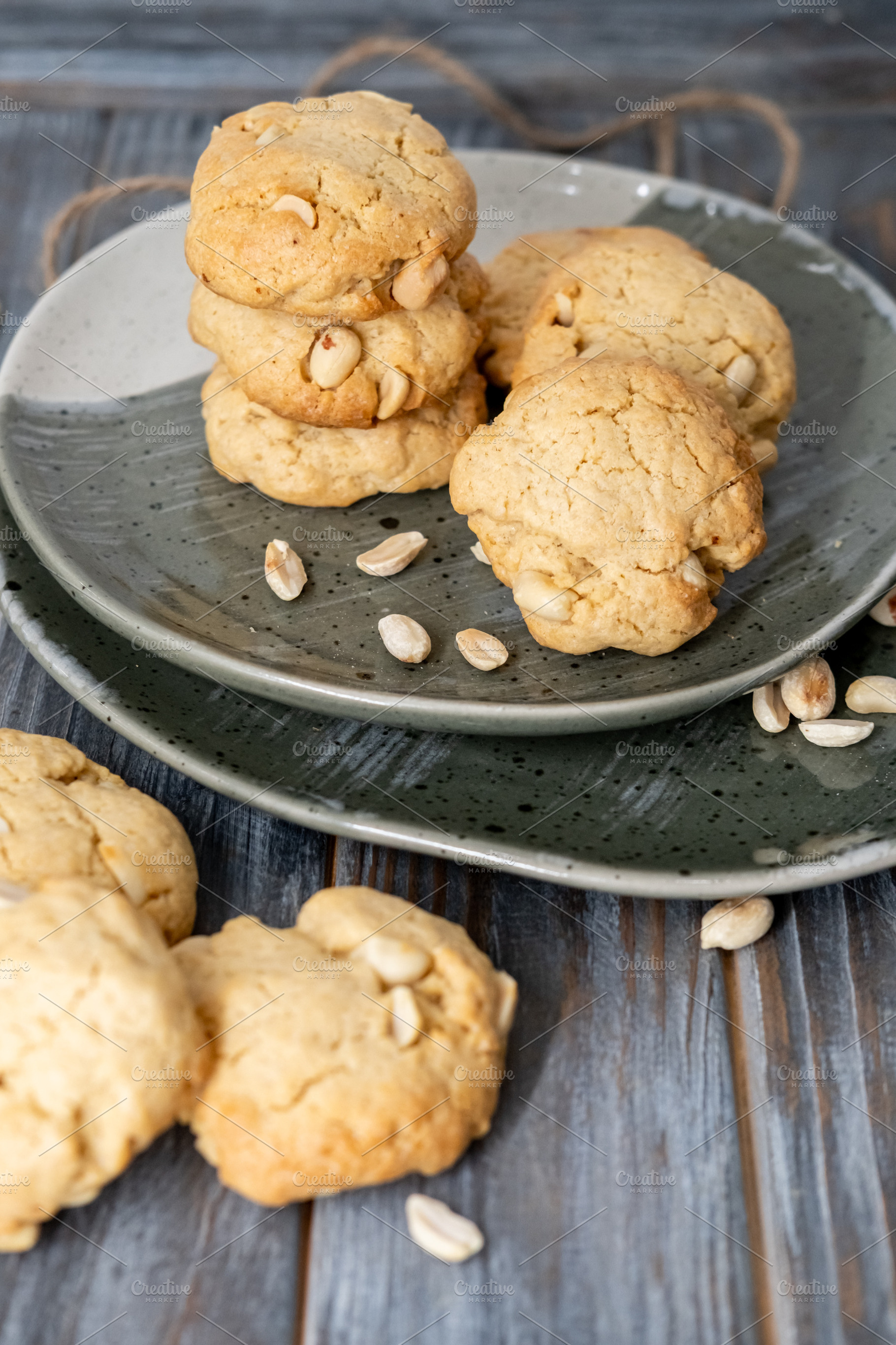 Homemade cookies rustic snack peanut pile plate, a Food & Drink Photo by Photo Drive Studio