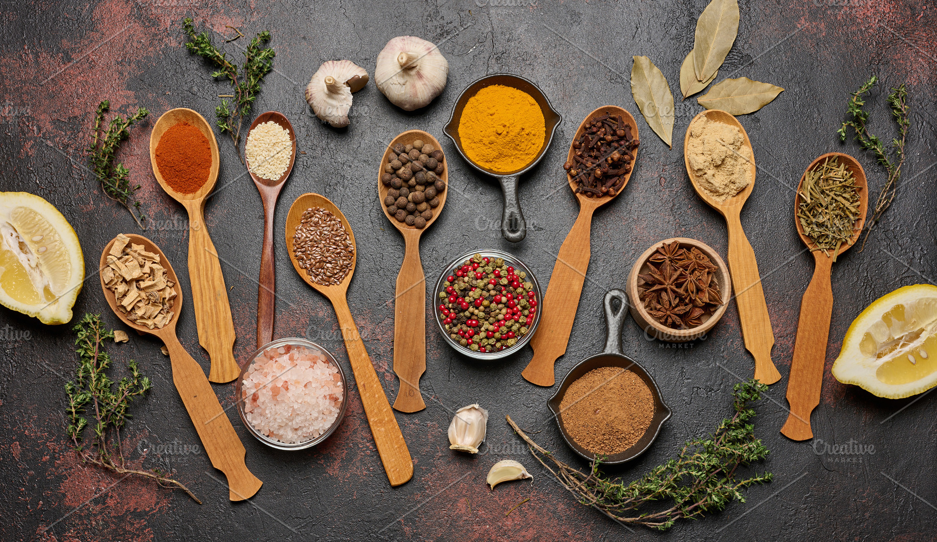 Spices in spoons and bowls on a dark background: turmeric, papri, a Food & Drink Photo by ndanko