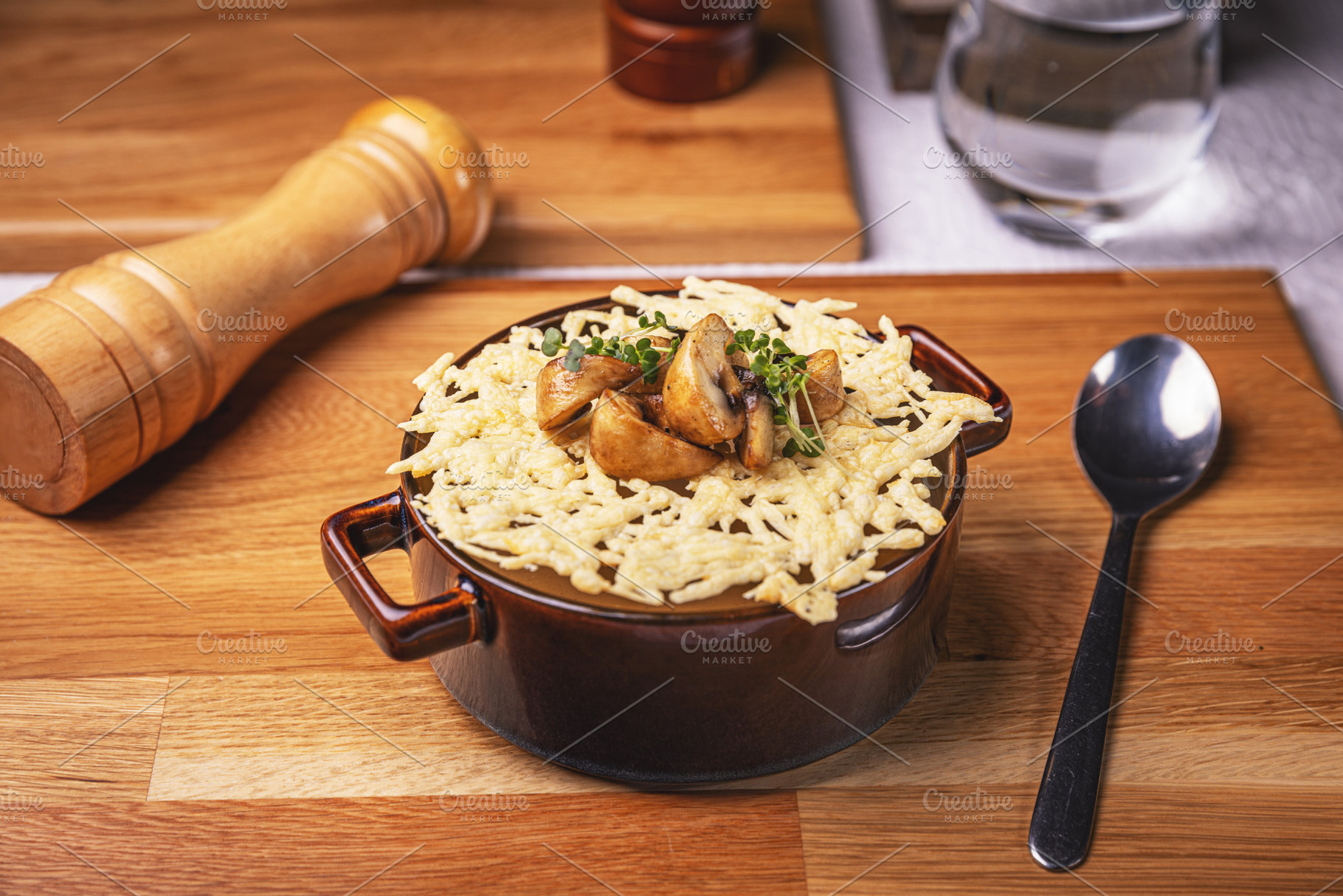 Mushroom cream soup with cheese topping, a Photo by Grafvision photography